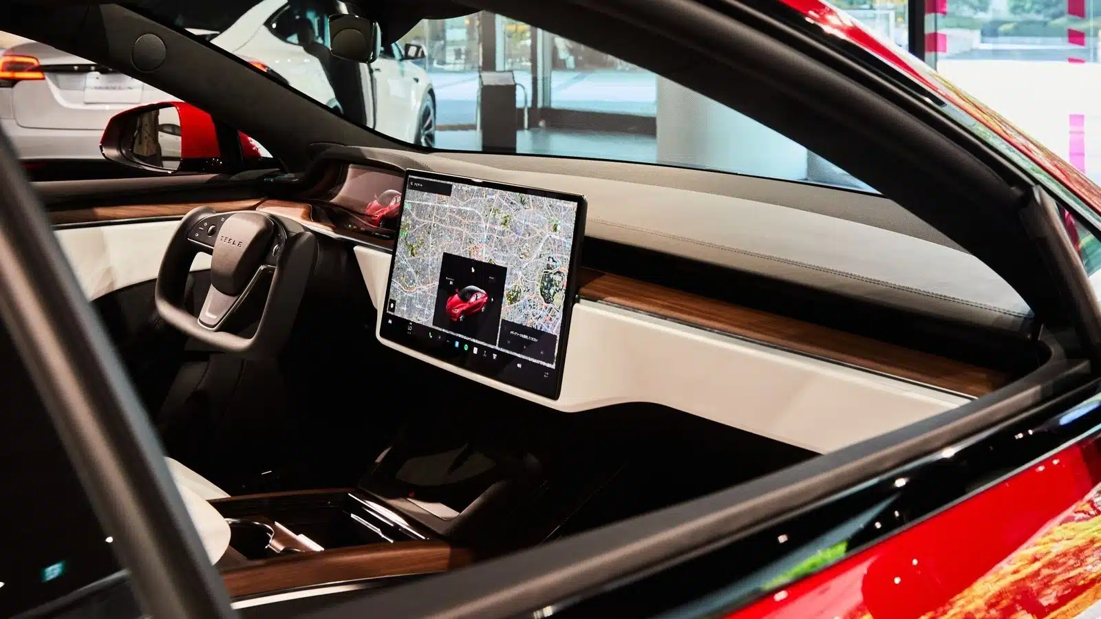 Tesla updates iPhone app to boost precision tracking and security akin to Apple AirTag tech